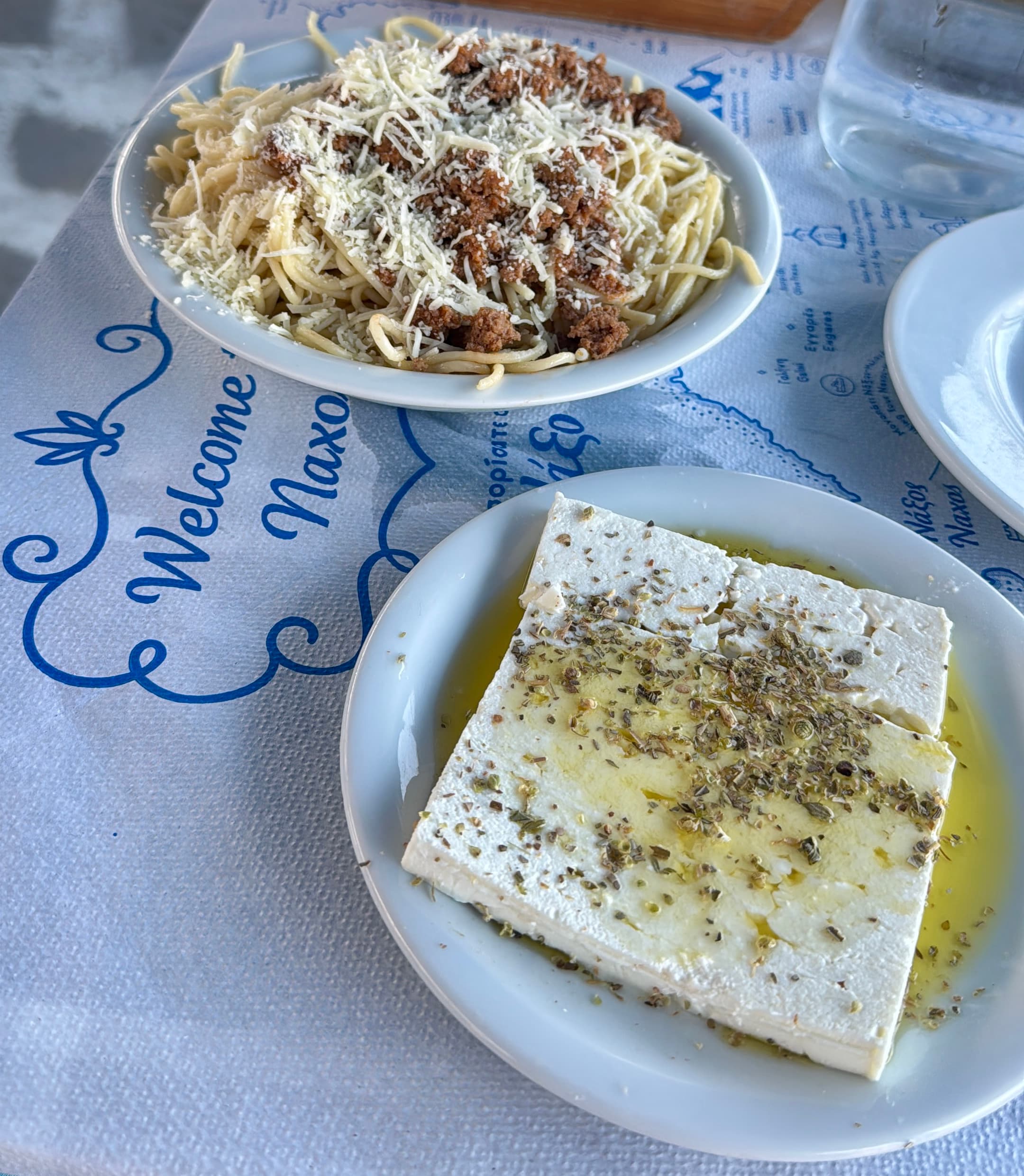 Feta with oregano and olive oil, and spaghetti with ground beef.