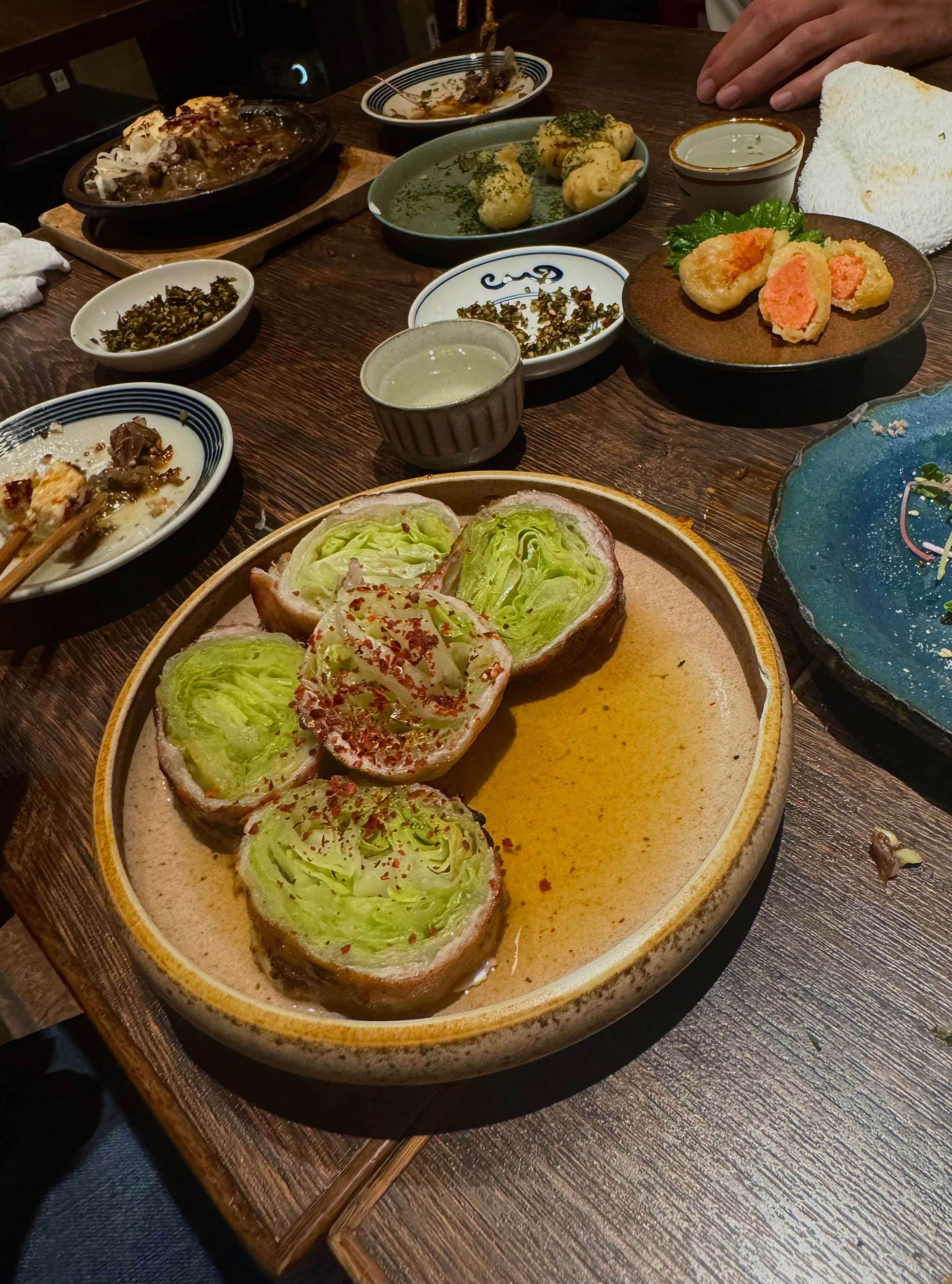 A selection of dishes from **Sakenomiki Bingo (酒呑気 びんご)**.