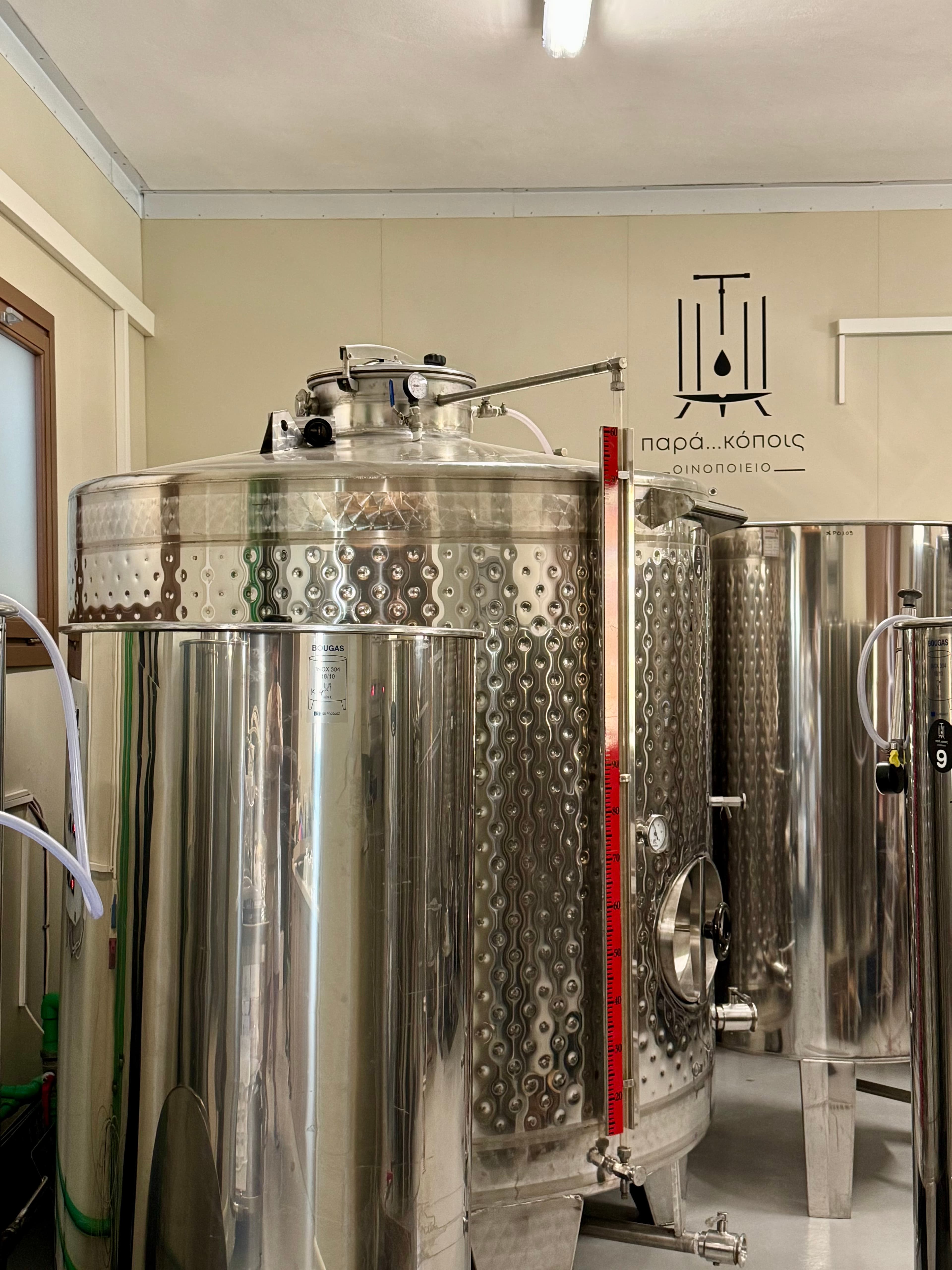 The stainless-steel tanks that store the wine until it is ready for bottling.