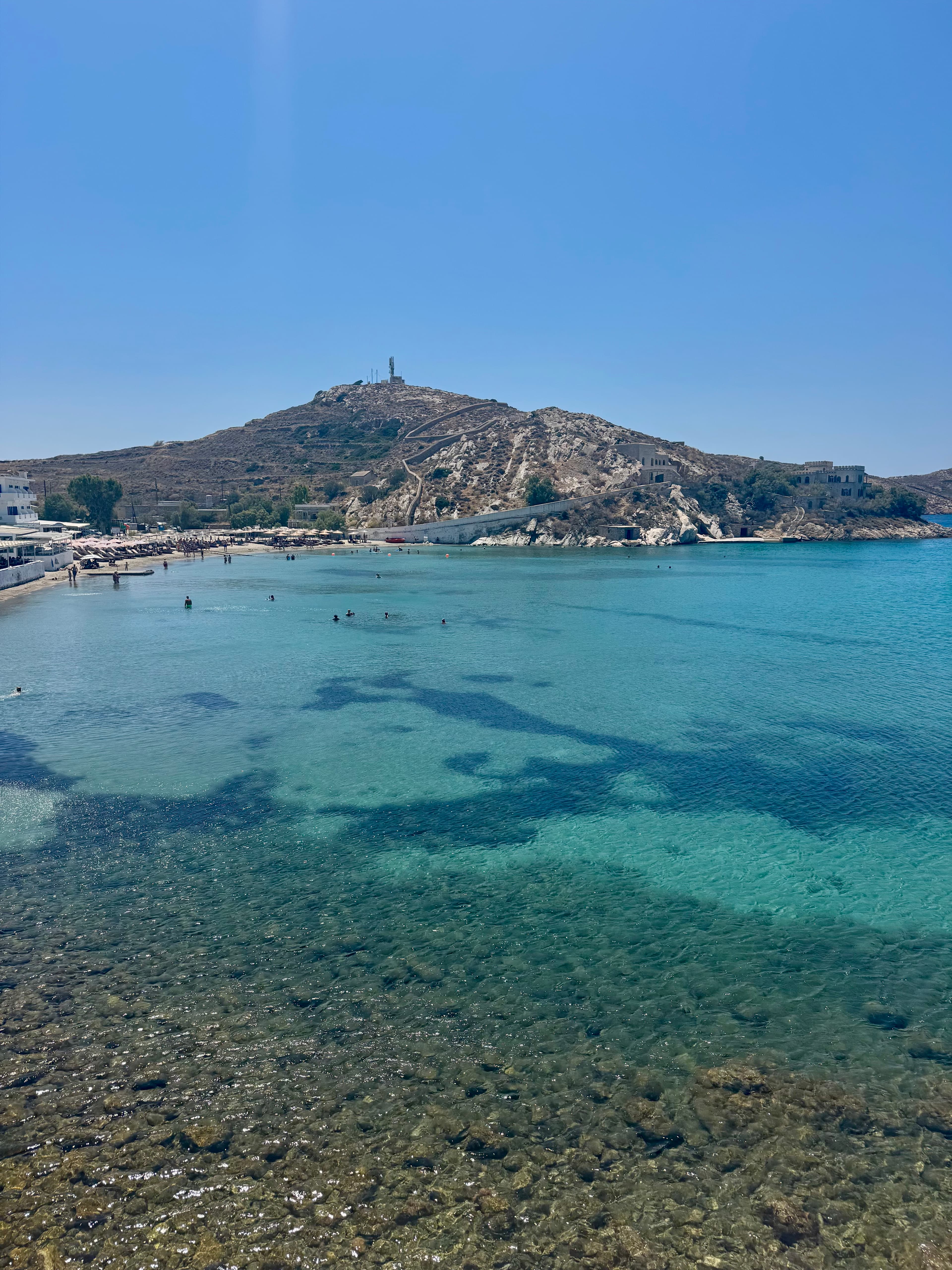 The beach at Vari, located near the distillery.